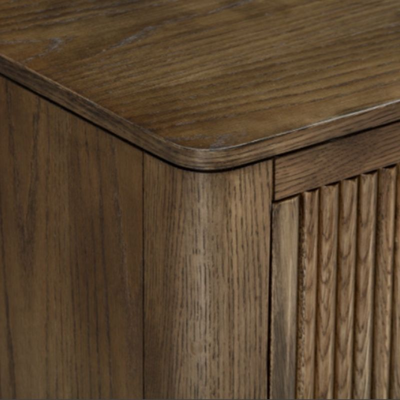 Close-up of a wooden cabinet with a focus on texture and grain.