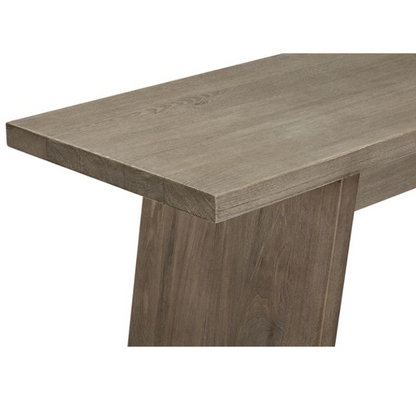 Wooden table with a light brown finish on a white background