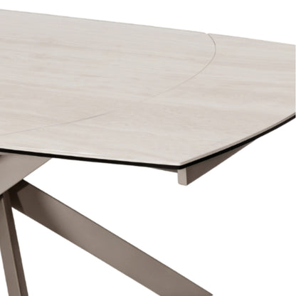 Close-up of a modern dining table showing a light beige wood grain tabletop with a glass edge and a taupe metal base on a white background.