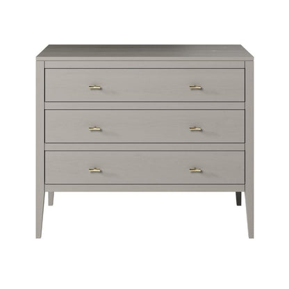 Gray dresser with gold handles on a white background.