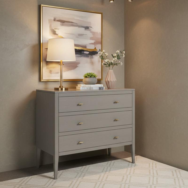 Grey dresser with decorative items against a neutral wall