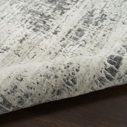 Textured rug with a pattern on a wooden floor