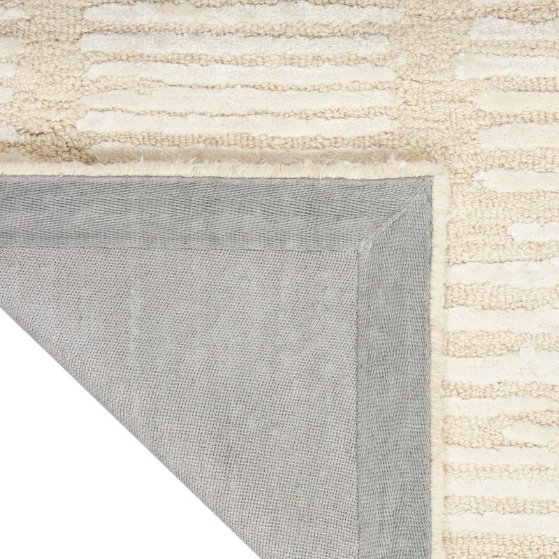 Close-up of a textured rug with a geometric pattern on a white background