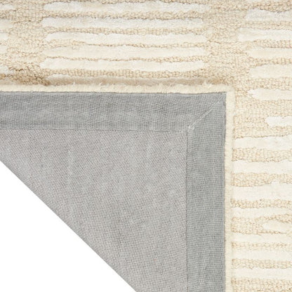Close-up of a textured rug with a geometric pattern on a white background