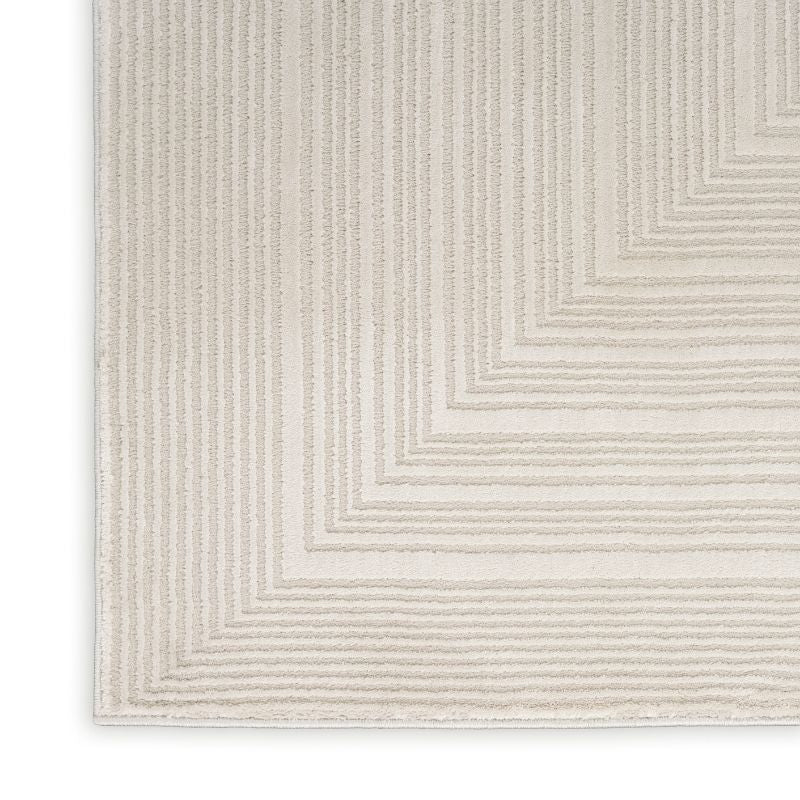 Textured rug with a geometric pattern on a white background