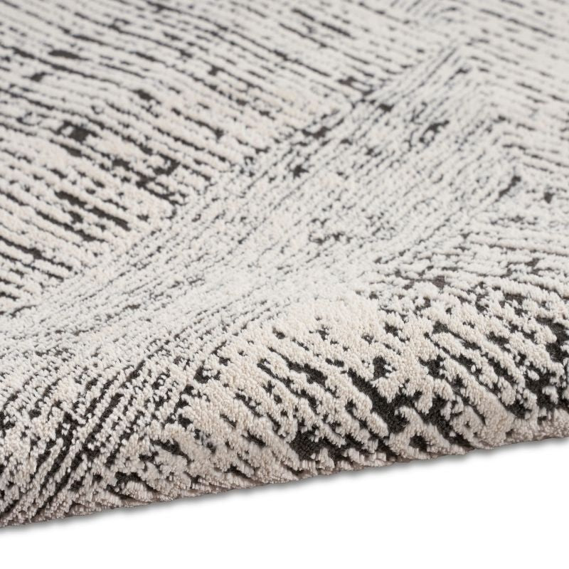 Close-up of a textured black and white rug