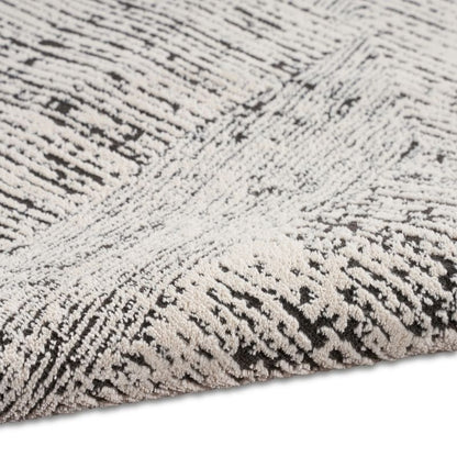 Close-up of a textured black and white rug