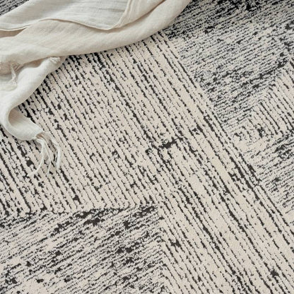 Calvin Klein Irradiant Cream & Black Abstract Rug