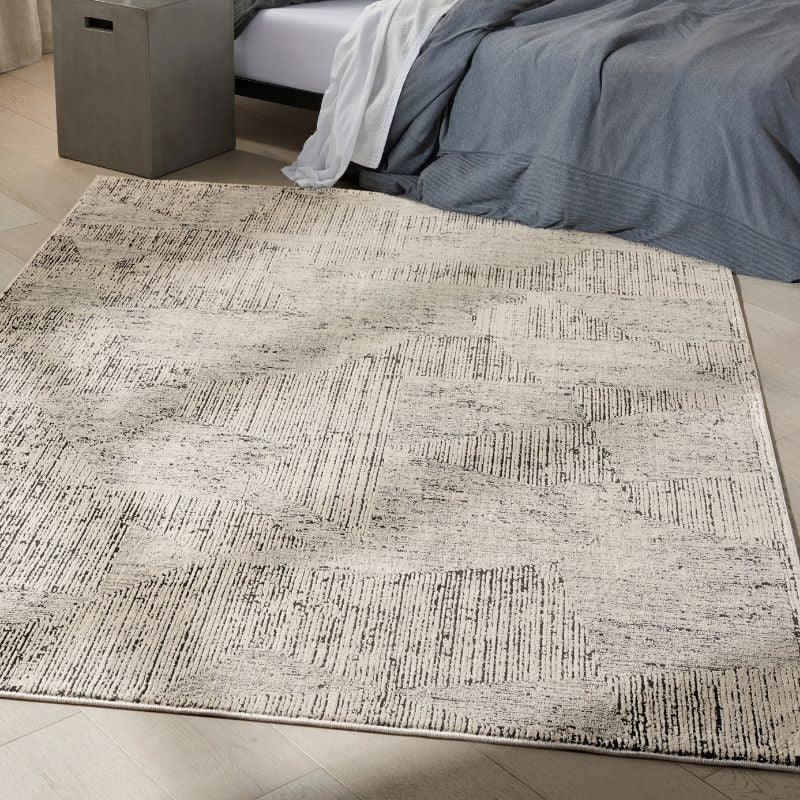 Calvin Klein Irradiant Cream & Black Abstract Rug
