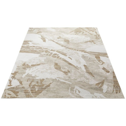 An abstract area rug with a modern, painterly pattern in beige, cream, and light brown tones, shown from a top-down perspective on a white background.