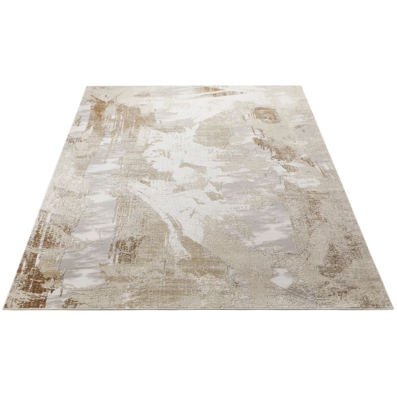 An abstract area rug with a distressed, painterly pattern in beige, cream, taupe, and light brown tones, shown from a top-down perspective on a white background.