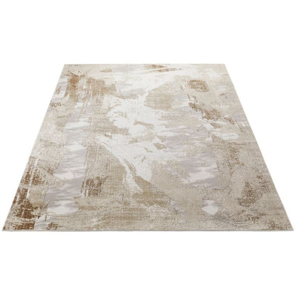 An abstract area rug with a distressed, painterly pattern in beige, cream, taupe, and light brown tones, shown from a top-down perspective on a white background.