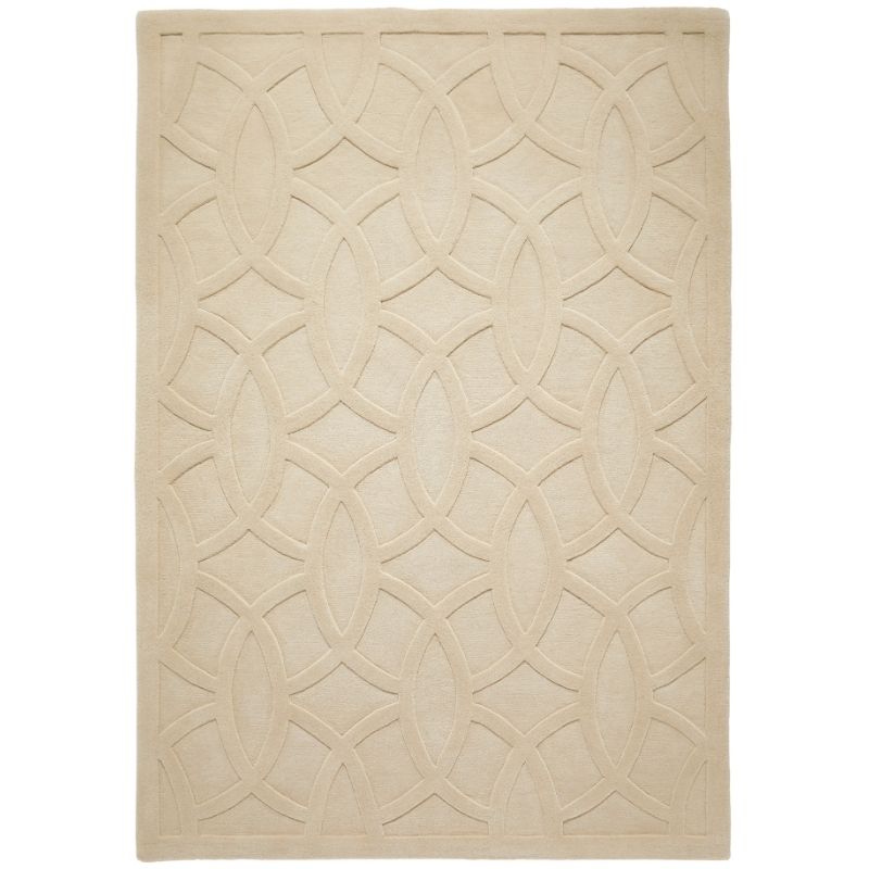 A rectangular area rug in a light beige or cream color, featuring a raised geometric pattern of interlocking oval and diamond shapes.