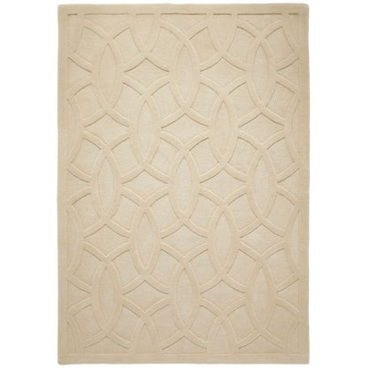 A rectangular area rug in a light beige or cream color, featuring a raised geometric pattern of interlocking oval and diamond shapes.