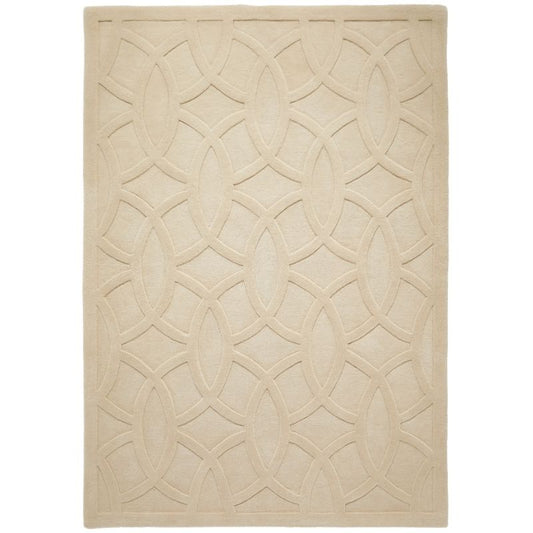 A rectangular area rug in a light beige or cream color, featuring a raised geometric pattern of interlocking oval and diamond shapes.