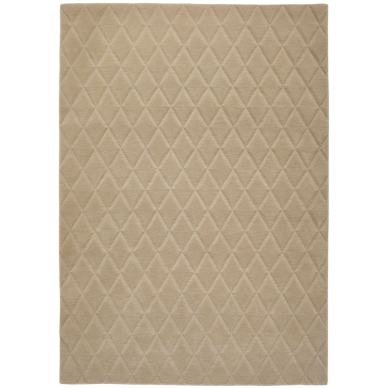 A rectangular beige area rug with a quilted diamond pattern, shown flat against a white background.
