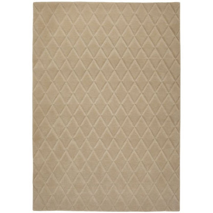 A rectangular beige area rug with a quilted diamond pattern, shown flat against a white background.