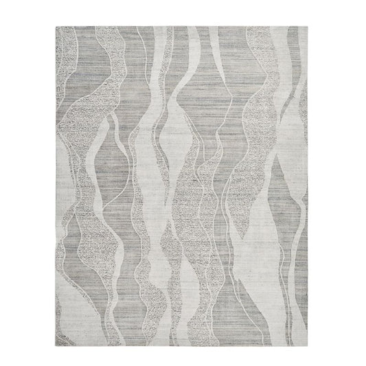 A square area rug with a modern abstract pattern of wavy vertical bands in light gray, medium gray, and off-white, showing a subtle woven texture.