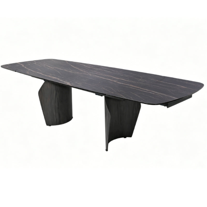 A modern rectangular conference table with a dark wood-grain top and sculptural pedestal legs, shown on a plain white background.