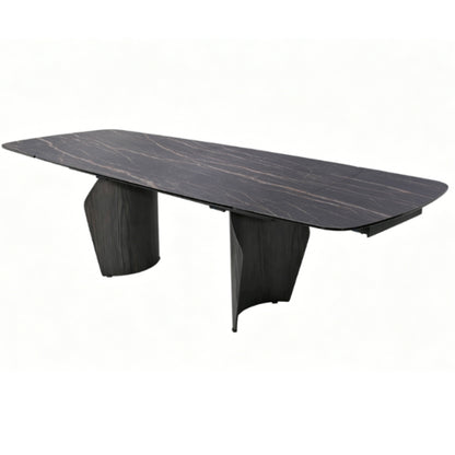 A modern rectangular conference table with a dark wood-grain top and sculptural pedestal legs, shown on a plain white background.