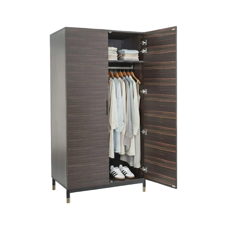 Wooden wardrobe with open doors displaying clothes and shoes on a white background