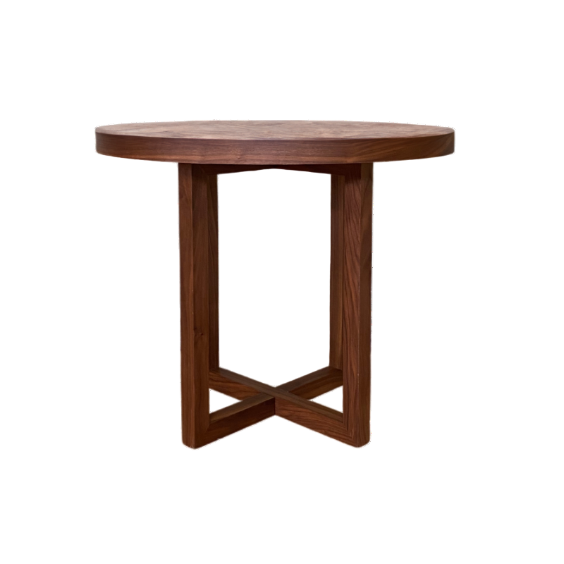 Wooden side table with a unique base design on a white background