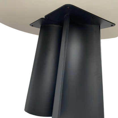 Black metal table leg on a white background