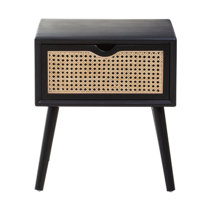 Black side table with a woven drawer on a white background