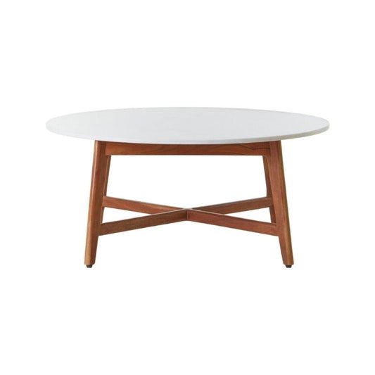 Round coffee table with white top and wooden legs on a white background