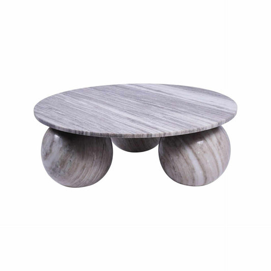 Marble coffee table with three spherical bases on a white background
