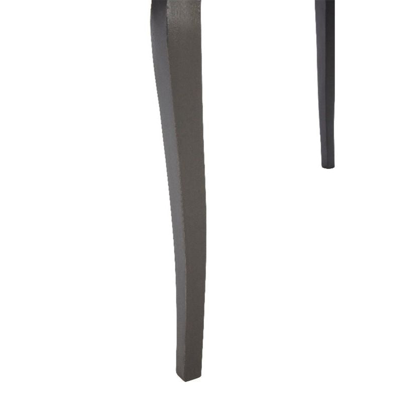 Close-up of a dark grey wooden leg on a white background