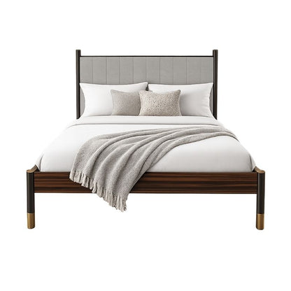 Wooden bed with gray upholstered headboard and white bedding on a white background