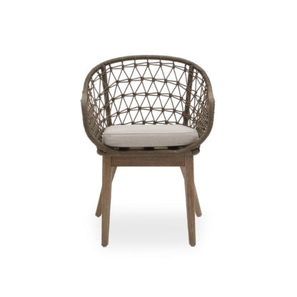 Wicker chair with a cushion on a white background