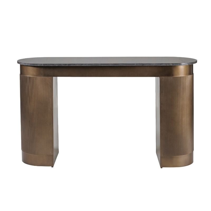 Modern dining table with bronze base and marble top on a white background